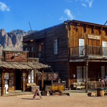 Buildings in the Goldfield Ghost Town with Superstition Mountains